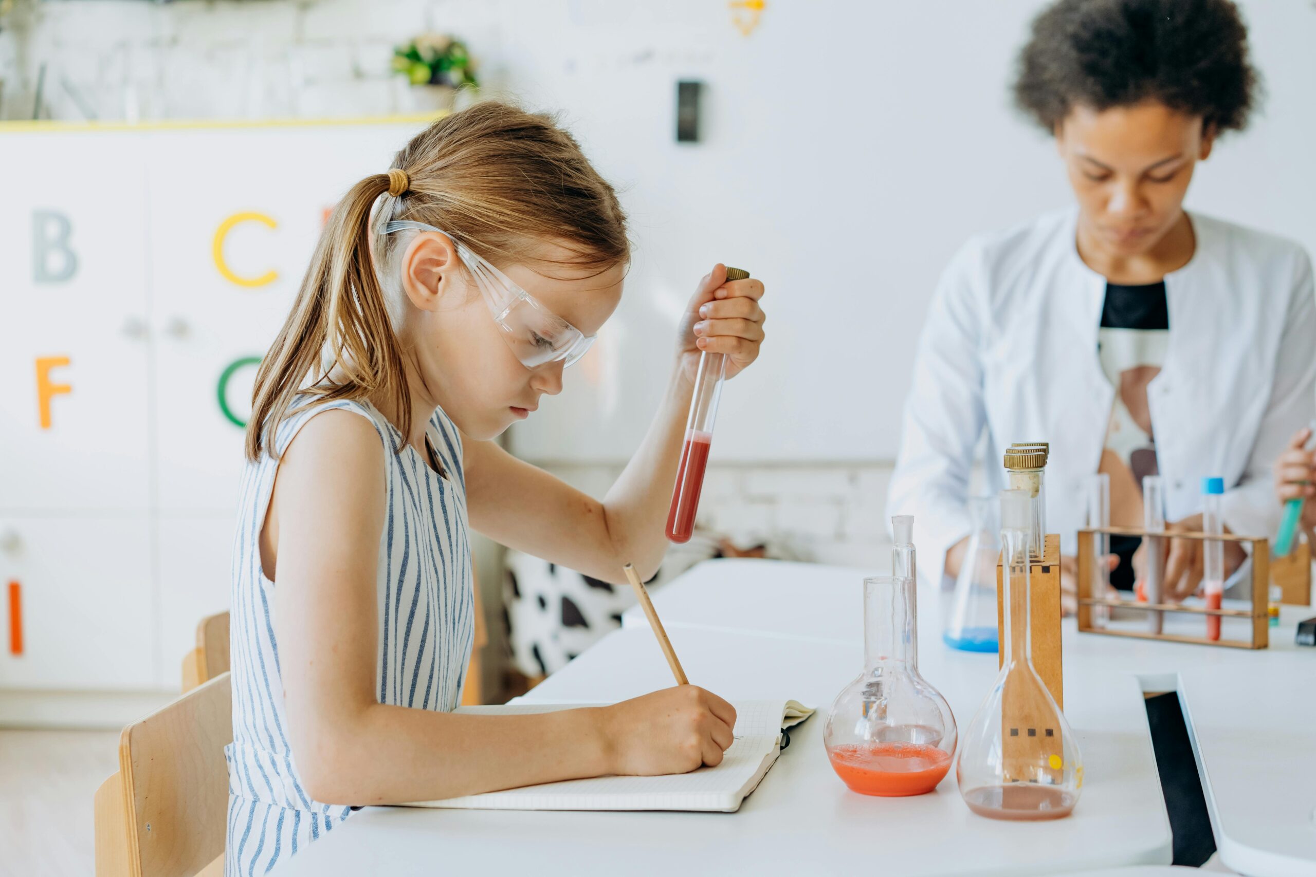 A person learning through an experiment.