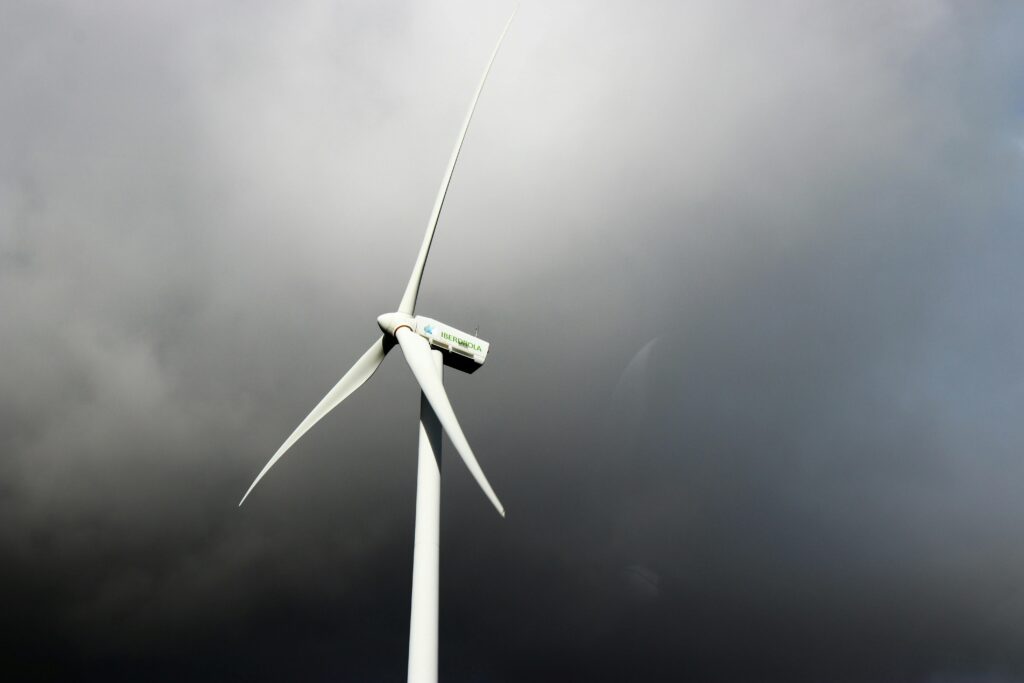 A windmill on a dark gray day