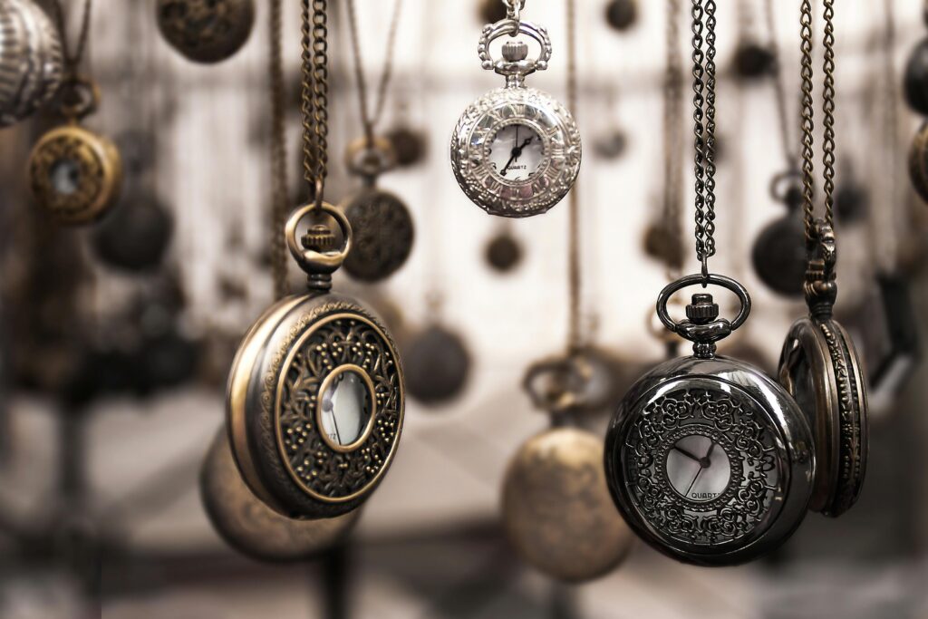 A group of similar but different watches showing different times.