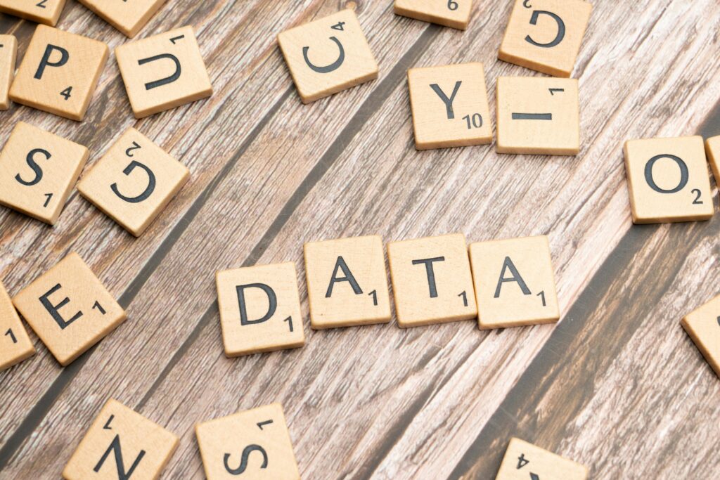 An image of a scrabble game with the word data.