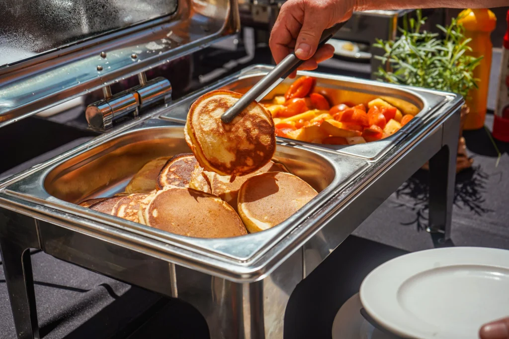 Breakfast items in a chaffing dish